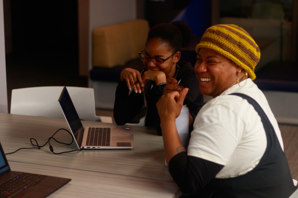 Teams building together at the hackathon